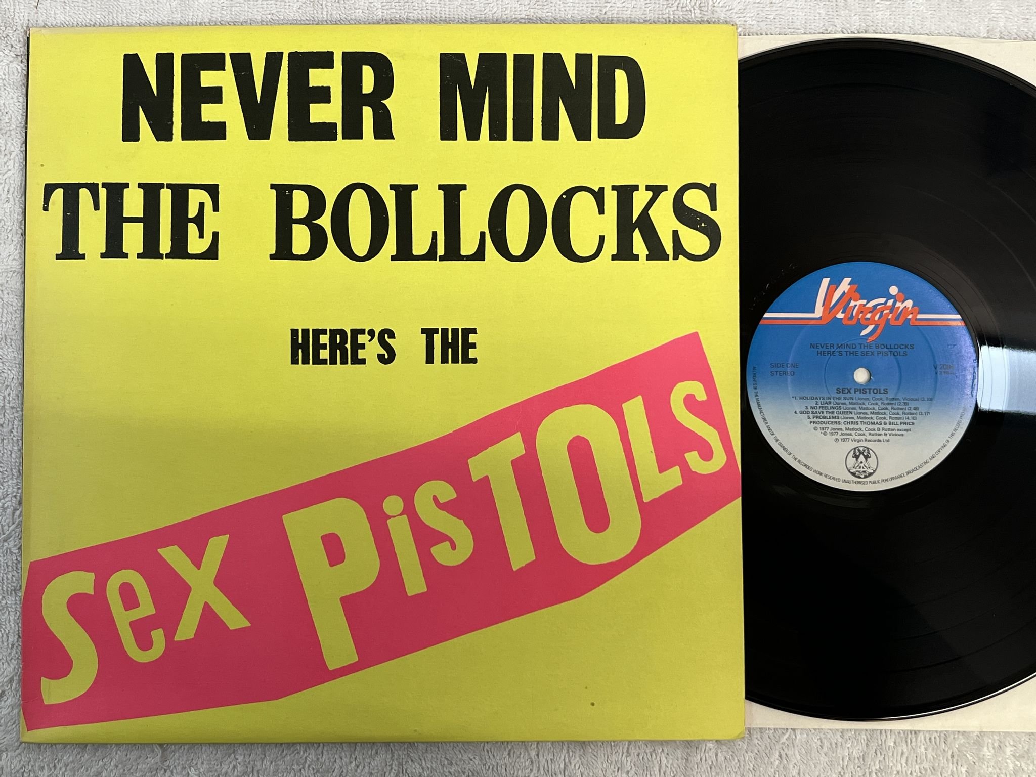 Omslagsbild för skivan THE SEX PISTOLS never mind the bollocks LP -77 UK ** 11 Track / Blank back **