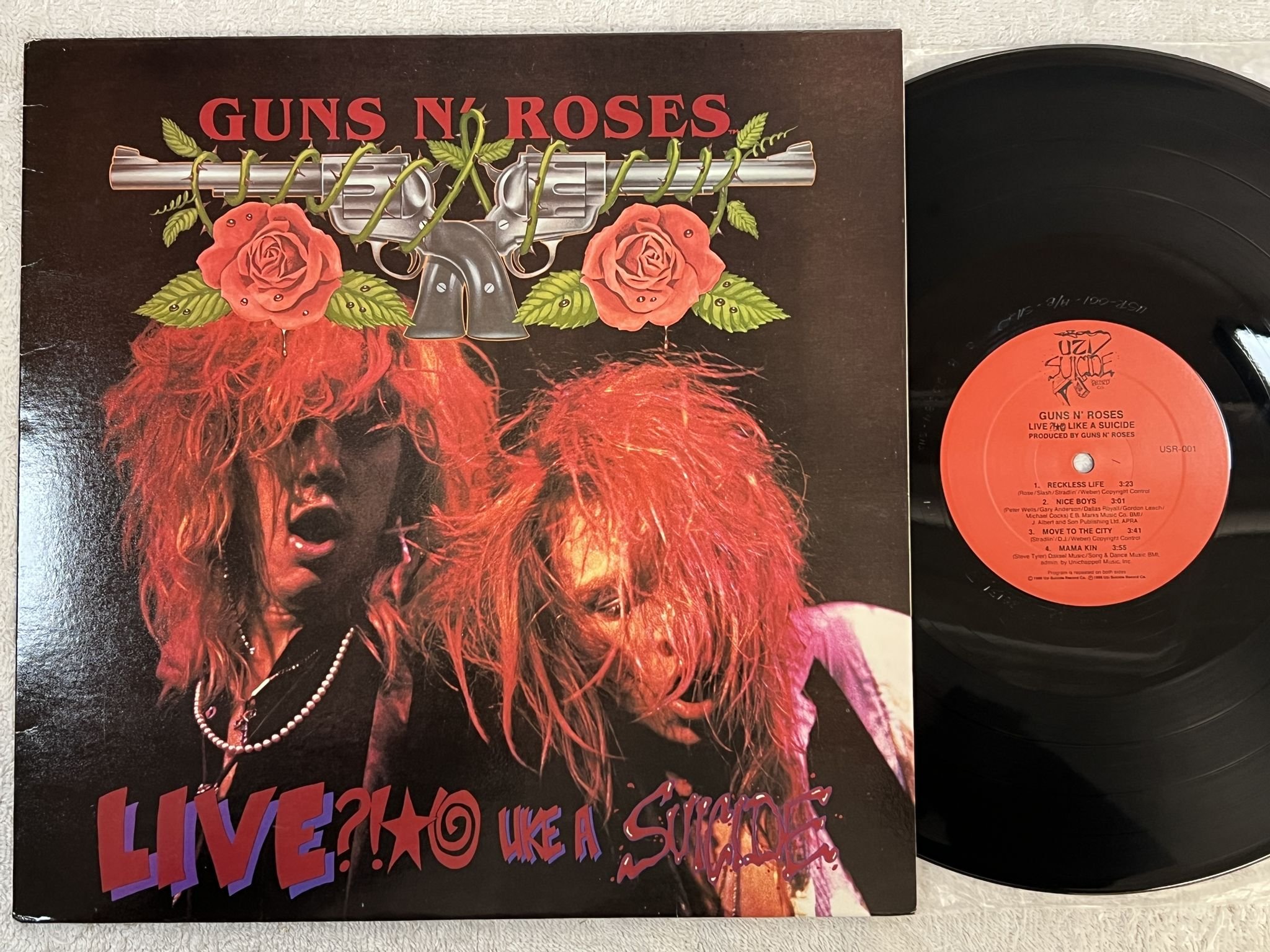 Omslagsbild för skivan GUNS N ROSES Live ?!?@ Like A Suicide 12"ep US ** Mega Rare 1st Press OG Wow! **