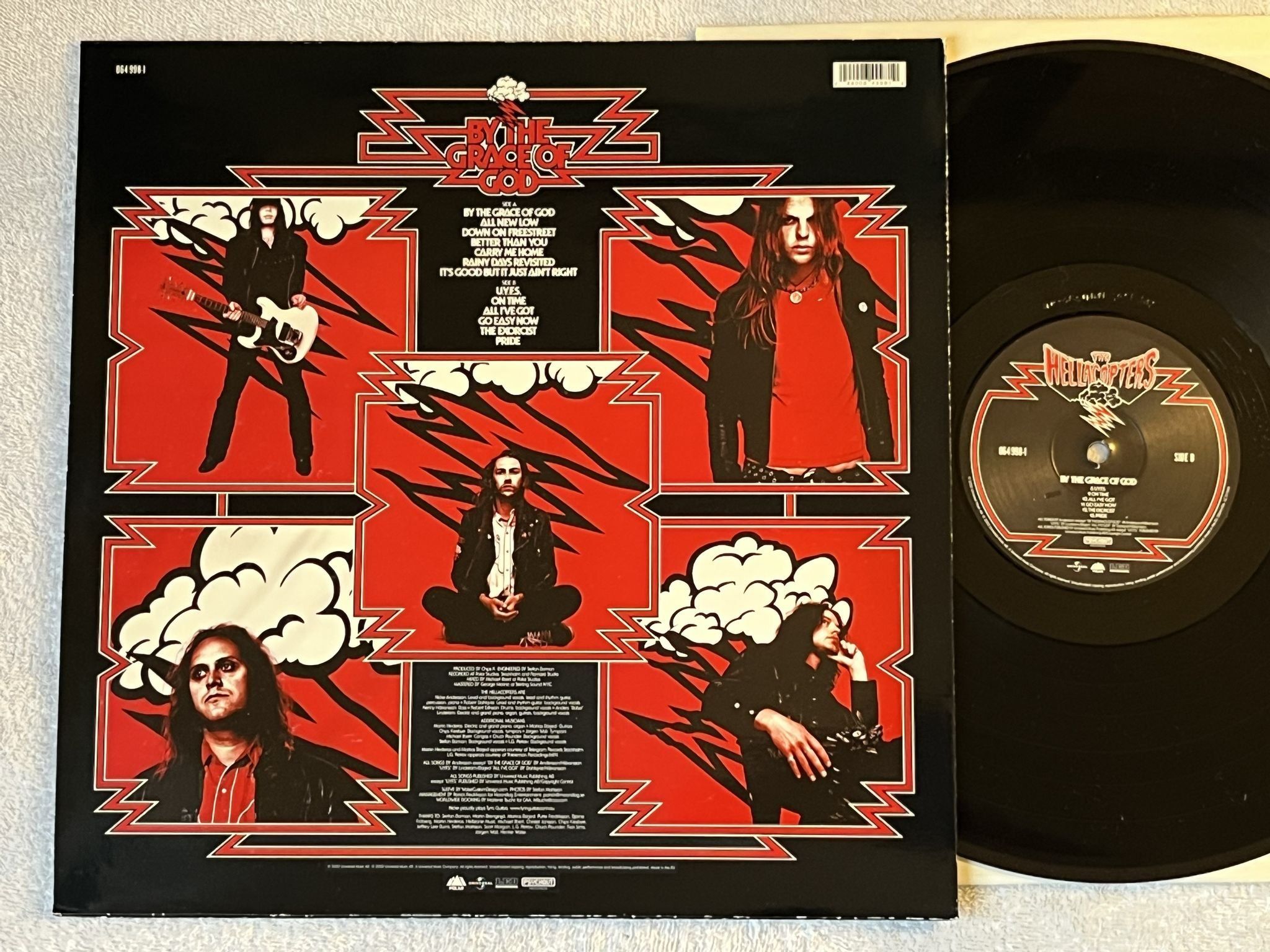 Omslagsbild för skivan HELLACOPTERS By The Grace Of God LP 2002 universal 064 998-1 *** VERY RARE ****