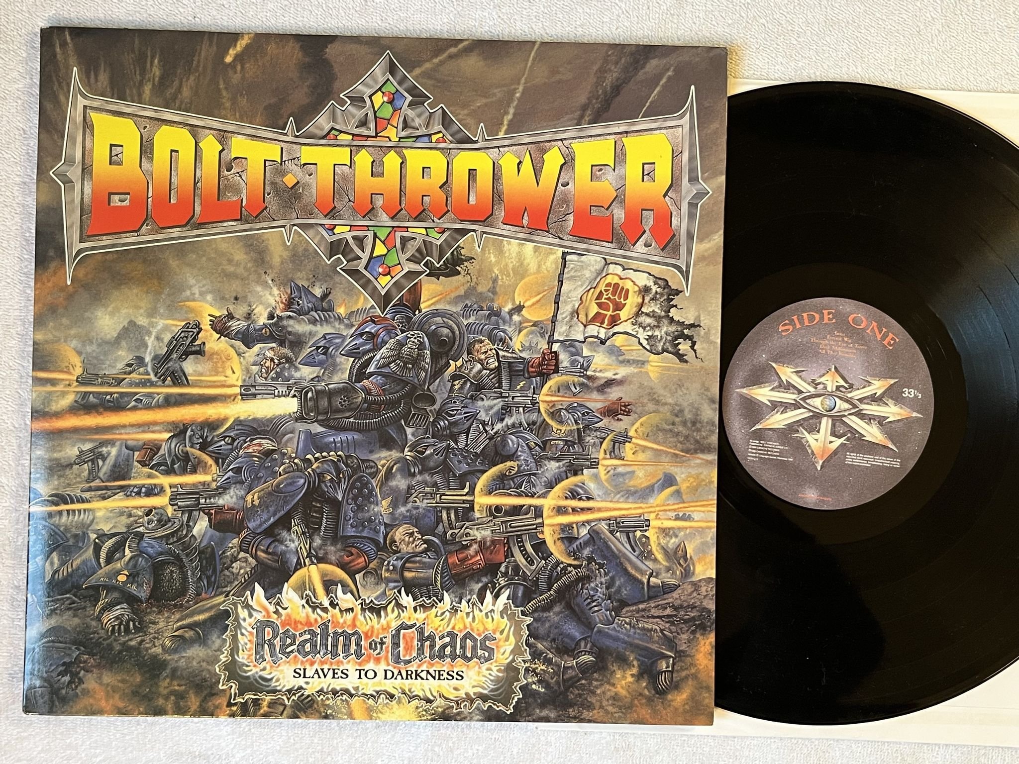 Omslagsbild för skivan BOLT THROWER Realm Of Chaos LP -89 UK EARACHE MOSH 13 *** Death Metal ***